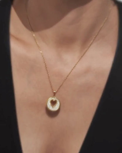 Collier en acier inoxydable et zirconium – L’amour au centre